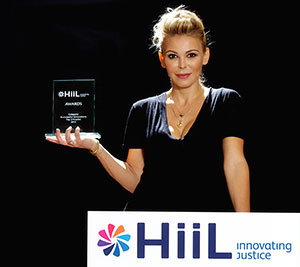 Sanela Diana Jenkins with Innovating Justice Award from Hague Institute for the Internationalisation of Law